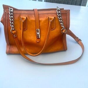 This bag that was gently used. It's leather.